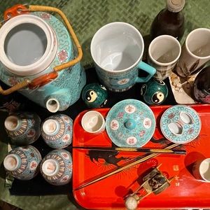 From Japan made in China tea set a two tall saki cups, four matching tea cups